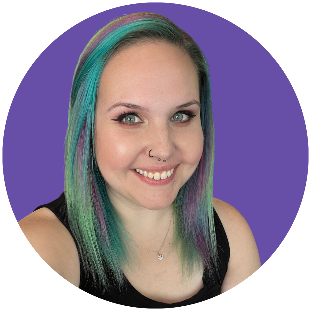 A picture of Brooklyn with blue, green and pink hair wearing a black tank top in front of a purple background